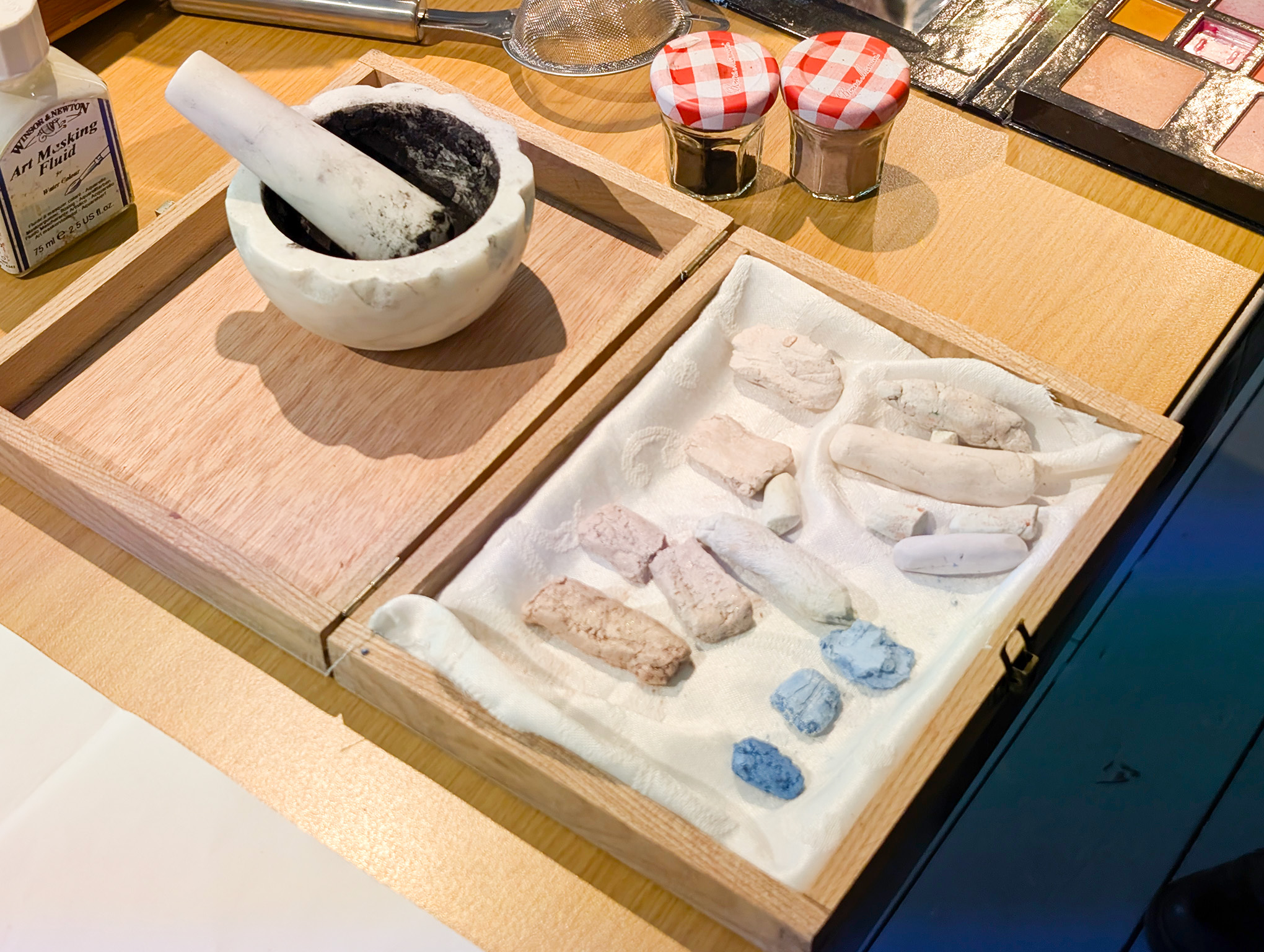 Handmade pastels ground from old make-up and natural pigments